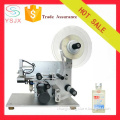 Manual sticker label applicator self adhesive flat bottle sticker labeling machine